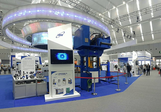 XIRO exhibition stand with brand signboards and equipment solutions display area