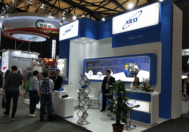 XIRO sales and engineering team welcoming global visitors at company event